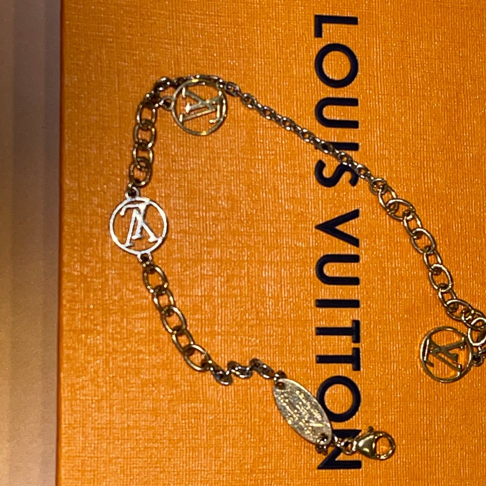 Louis Vuitton gold and silver charm bracelet
